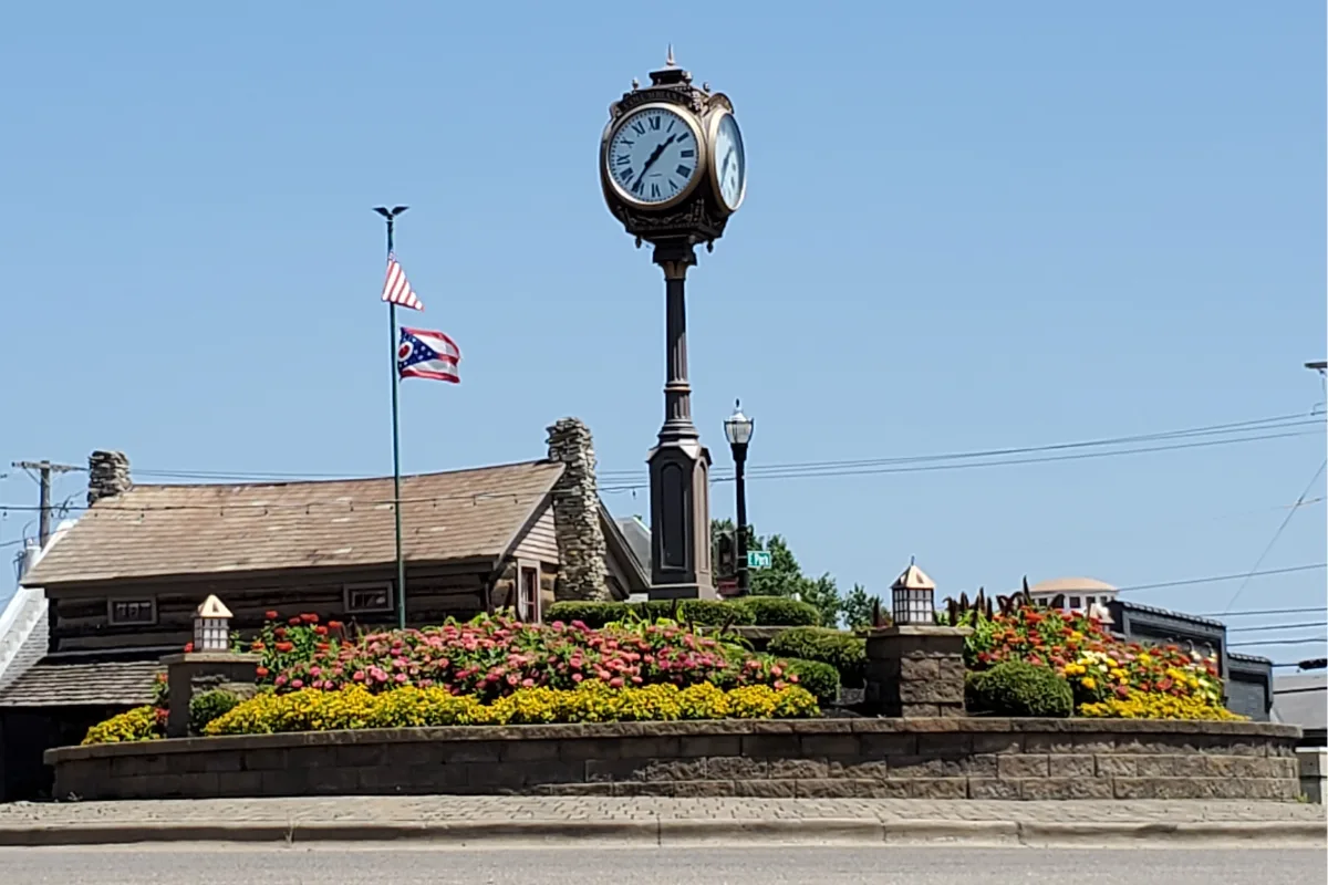 a roundabout in Columbiana, Ohio that has a clock in the center of it.