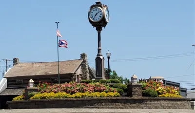 a roundabout in Columbiana, Ohio that has a clock in the center of it.